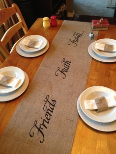 the table is set with place settings for dinner