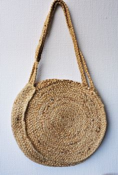 Welcome to my shop. These bags are environmentally friendly and made from 100% natural jute. These bags are made for your long walks, to ensure your travel comfort and give you elegant beach style. It adds casual charm to your everyday personality. The straps are made fine and strong so you can easily carry them on your shoulder and your hands are free. Hence a very convenient type of bag. Item: handmade braided Size: 25x25x65cm & 30x30x60cm Type: shoulder bag / cross for bag Material: 100% jute Production area: Panipat India Delivery time: We take 3-5 days to deliver. We believe in getting customers' trust and also ready to receive bulk orders. IMPORTANT: Please make sure your shipping address is correct. Without exception, the customer bears the cost of lost / damaged items due to incorr Fair Trade Jute Crochet Bag For Daily Use, Eco-friendly Handmade Jute Shoulder Bag, Eco-friendly Handmade Jute Bag, Eco-friendly Fair Trade Natural Crochet Bag, Eco-friendly Fair Trade Jute Straw Bag, Handmade Natural Jute Shoulder Bag, Eco-friendly Handmade Natural Shoulder Bag, Fair Trade Everyday Jute Bags, Bohemian Burlap Bag In Natural Color