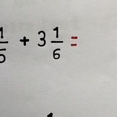 the numbers are written in black and red on a white surface with an arrow pointing to them