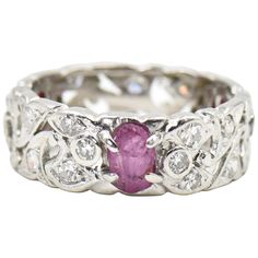 This stunning Art Deco platinum ring features 3 rubies with leaf carvings prong set between diamond vines. The ring has approximately 1 carat of diamonds. US size 7. Memory Ring, Art Deco Diamond, Platinum Ring, Eternity Band, 1 Carat, Eternity Bands, Prong Setting, Band Rings, Vines