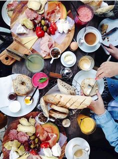 a table full of food and drinks on it