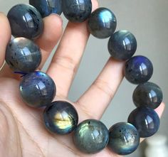 Material:Labradorite beads size :labradorite 17mm   quantity: one strand  6mm approx 29 pcs one strands 7mm approx25 pcs one strands 8mm approx 22 pcs one strands 9mm approx 21pcs one strands 10mm approx 19 pcs one strands 11mm approx 18pcs one strands 12mm approx 16 pcs one strands 13mm approx 16 pcs one strands 14mm approx 15 pcs one strands 15mm approx 14pcs one strands 16mm approx 14 pcs one strands 17mm approx 13pcs one strands 18mm approx 13pcs one strands 19mm approx 12pcs one strands 20mm approx 12pcs one strands PLEASE NOTE: 1.Due to lighting effects, monitor's brightness/contrast settings etc, there could be some slight differences in the color tone of the pictures and the actual item. 2.Each piece of natural crystal is unique, the imperfections add natural characters to them. Th Natural High, Labradorite Beads, Beads Bracelet, Colour Tone, Natural Crystals, Flashlight, Jewelry Gift, Moonstone, Labradorite