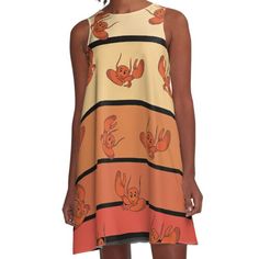 a women's dress with crabs on it and an orange, yellow and black stripe