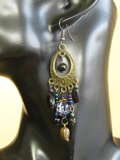 Bohemian Earrings Long Drop Hook Rainbow Oil Slick Chandelier Bronze Colorful Beaded Brass Dangle Earrings, Black Bohemian Teardrop Dangle Earrings, Elegant Multicolor Metal Beaded Earrings, Handmade Black Bohemian Teardrop Earrings, Black Bohemian Long Drop Earrings, Black Teardrop Chandelier Earrings With Dangling Beads, Elegant Colorful Beads Teardrop Dangle Earrings, Bohemian Black Teardrop Earrings As Gift, Black Bohemian Teardrop Earrings For Gift