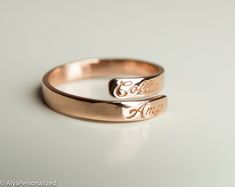 Engraved personalized name ring; wedding bands for women... Also perfect promise ring for your special woman ♡ ► FEATURES; Material Options: 14k Rose Gold, 14k Yellow Gold, 14k White Gold Size: All ring sizes are available ► HOW TO ORDER; Please select your preffered size and material from the menu while adding to card. ► PROCESSING & SHIPPING ❥We ship to worlwide, please check current delivery times depending on your location at the bottom of this page ❥Shipping time is 2-5 days to US. ❥Ple Engraved Rose Gold Rings For Personalized Gift, Personalized Engraved Rose Gold Ring, Rose Gold Engraved Ring With Name For Gift, Rose Gold Engraved Name Ring As Gift, Rose Gold Engraved Name Ring For Gift, Elegant Rose Gold Rings For Personalized Gift, Personalized Rose Gold Engraved Ring For Promise, Personalized Rose Gold Engraved Ring For Gift, Personalized Engraved Rose Gold Promise Ring