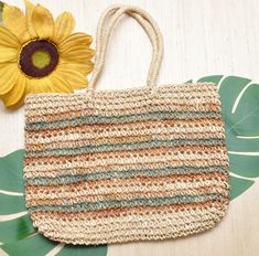 "Perfect for summer stylin. A great weaved tote bag in beige, green and brown tones. From the 80's made by Jacqueline Ferrar. The bag is in nice condition, lined in a beige linen feeling fabric, one inside pocket, snaps closed on top. Large tote size with two shoulder handles. 19\" long 13\" tall 10\" strap hang" Natural Retro Tote Bag, Vintage Green Shoulder Bag For Summer, Retro Natural Color Summer Bag, Vintage Beige Beach Bag For Summer, Retro Natural Straw Bag For Everyday Use, Retro Natural Straw Bag For Everyday, Retro Natural Shoulder Bag For The Beach, Retro Natural Bags For Vacation, Retro Natural Shoulder Bag For Beach