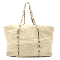 CHANEL Luxury Line Coco Mark Tote Bag Chain Shoulder Leather Beige A31574Brand: ChanelGender: WomenModel: A31574Color: BeigeMaterial: LeatherComes with: NoneSize (HxWxD): 30cm x 54cm x 15cm / 11.81'' x 21.25'' x 5.9'' Designer Chain Shoulder Bag For Travel, Designer Shoulder Bag With Chain For Travel, Luxury Shoulder Bag With Chain For Shopping, Luxury Beige Shoulder Bag With Chain, Luxury Tote Shoulder Bag With Chain Strap, Tan Chanel Bag, Luxury Beige Shoulder Bag With Chain Detail, Chanel Cream Bag, Chanel Embossed Bag