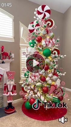 a christmas tree decorated with candy canes and candies