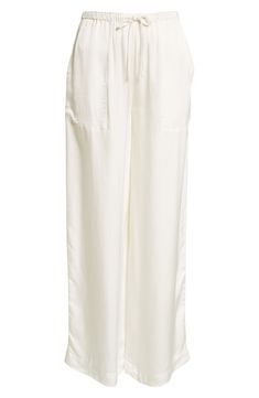 If you must step away from your pool chaise or beach towel, pop on some cotton pants closed with a comfy drawstring. Drawstring waist Front patch pockets 100% cotton Machine wash, line dry Imported Summer Loungewear Bottoms With Patch Pockets, Summer Loungewear Pants With Patch Pockets, White Linen Lounging Bottoms, Relaxed White Bottoms With Pockets, Chic White Bottoms With Drawstring, Chic White Drawstring Bottoms, White Relaxed Pants For Lounging, White Relaxed Lounge Pants, Relaxed White Lounge Pants