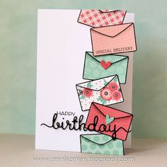 a handmade birthday card with envelopes on it