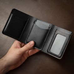 This is a substantial leather trifold wallet.When you're out for dinner with friends, they will notice when you throw this wallet on the table. A loud thud followed by eyes fixed on this beautifully constructed piece will make an impression. Immaculate hand-stitching and full-grain Horween leather compliment a smartly designed, but hefty wallet.This full-grain Horween leather wallet is designed to hold a lot of cards and a lot of cash. Easily flip out your ID when it's needed and the wallet will Full Grain Leather Wallet, Mens Card Holder, Leather Trifold Wallet, Leather Supplies, Engraved Initials, Horween Leather, Flip Out, Leather Workshop, Dinner With Friends