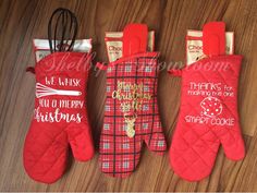 three oven mitts with christmas designs on them