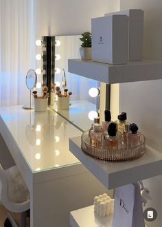 a vanity with lights on it in a room