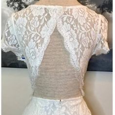 Nwt - Timeless Ivory Floral Lace Lined Dress With Beautiful Open Back. Delicate Button At Back Of Neck, Zip And Hook Closure In Back. Unlined Lace Short Sleeves. Size Small. Dress Is New With Tags, In Perfect Condition And From A Smoke Free Home. Perfect For A Bridal Event Or Just A Classic Dress For The Spring Or Summer! Fitted White Mini Dress With Lace Back, White Fitted Mini Dress With Lace Back, White Lace Back Mini Dress For Date Night, Elegant White Dress By Forever 21, Elegant White Forever 21 Dress, Forever 21 White Short Sleeve Dresses, White Tank Dress, Black Ruched Dress, Emerald Dresses