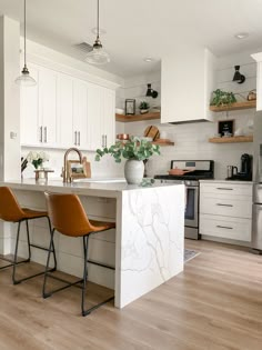 the kitchen is clean and ready to be used as a dining room or office space