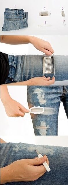 someone is using a toothbrush to brush their jeans with something white or blue that they are holding