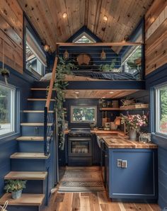 the interior of a tiny house with stairs