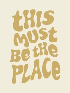 this must be the place hand drawn typograph on white paper with brown lettering