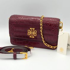 Nwt Auth Tory Burch Britten Croc Convertible Crossbody Shoulder Bag In Claret Croc Embossed Leather Gold-Tone Logo Plaque Color: Claret/639 Snap Closure Adjustable, Removable Leather And Metal Chain Shoulder Strap May Be Carried As Shoulder Bag Or Crossbody Interior Zip Pocket 8l X 2.5"W X 5" H Style Number 86063 No Dust Bag Included Tory Burch Crocodile Bag, Tory Burch Crossbody Handbags, Leather Crossbody Bag Tory Burch, H Style, Tory Burch Bag, Metal Chain, Crossbody Shoulder Bag, Embossed Leather, Snap Closure