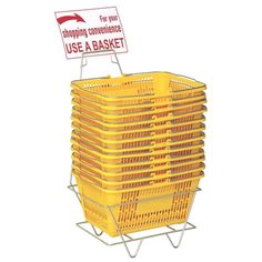 a yellow basket with a sign attached to it that says shopping for your use a basket