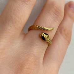 This ring is crafted in the shape of a snake. It has an elegant and neat design. It will perfectly complement your modern look. Material: Stainless Steel. Finish: 18k Gold Plated. 🔸more from us🔸 https://www.etsy.com/shop/DoraJewelryAccessory Snake Ring Gold, Snake Gift, Snake Ring, Gold Snake, Ring Gold, Adjustable Ring, Adjustable Rings, Rings Statement, Statement Jewelry