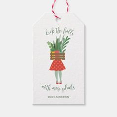 a gift tag with the words, look at the flowers and wait more plants on it