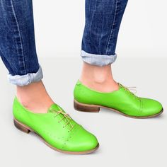 Leather; upper & lining Man-made sole 2.5 cm / 1.0" heel height Handcrafted in Europe Materials: A celebration of bright spring colours, these oxford shoes are built with a slim silhouette design and classic punched detailing. Wear these lace-ups with everything from tailoring to dresses to add a dose of androgynous cool. Material: Tropic Green Soft Leather Laces: Beige & Orange (bonus) Decorations: Brogues, Perforations Sole: Beige #1685 CUSTOMIZEBANNER460991377_ Casual Low Heel Lace-up Shoes, Green Flats With Rubber Sole And Round Toe, Casual Green Leather Shoes With Almond Toe, Green Casual Leather Shoes For Spring, Casual Green Leather Shoes For Spring, Derby Loafers With Rubber Sole And Flat Heel, Spring Green Leather Shoes With Rubber Sole, Green Round Toe Oxfords For Work, Green Oxfords For Work With Round Toe