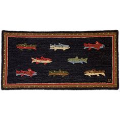 a rug with fish on it is shown