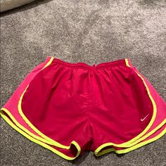 Red Nike Shorts With Pink And Yellow On The Sides. Never Worn. Nike Red Athletic Shorts, Nike Red Sporty Shorts, Nike Red Bottoms With Built-in Shorts, Red Nike Workout Bottoms, Nike Red Workout Shorts, Nike Sports Shorts In Red, Red Stretch Nike Athletic Shorts, Nike Red Stretch Athletic Shorts, Nike Red Shorts