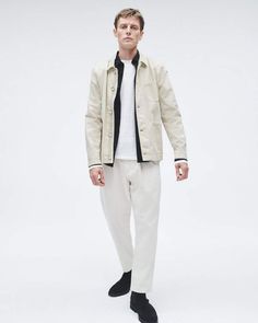 The Evan. A quintessential chore jacket in stretch twill for a more refined take on a workwear classic. Lightweight and relaxed, this style also features contrasting seam binding for a just-for-you detail. Turtledove XS Classic White Utility Jacket For Work, Classic Utility Jacket With Relaxed Fit For Workwear, Classic Spring Utility Jacket For Work, White Utility Jacket With Flap Pockets For Work, Classic White Cotton Utility Jacket, White Utility Outerwear For Work, Men Apparel, Seam Binding, Chore Jacket