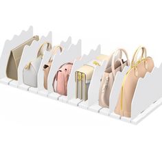 six purses are lined up in a row on a white display rack with gold handles