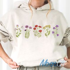 Wildflower Botany Embroidered Sweatshirt, Flower Sweatshirt, Crewneck sweatshirt embroidered, Bachelorette Day Outfit, Gift For Her Firstly, Thank you for shopping with us!  Seeking a distinctive and personalized gifts that will leave a lasting impression? Look no further than our custom Renaissance portraits. We understand the importance of finding the perfect gift for any occasion. Whether it's a birthday, Valentine's Day, Christmas, Mother's Day, Father's Day, anniversary, or any other specia Bachelorette Day Outfit, Embroidered Bachelorette, Daisy Sweatshirt, Flower Sweatshirt, Embroidery Tshirt, Embroidery Sweater, Embroidered Gifts, Embroidered Crewneck, Sweat Shirts