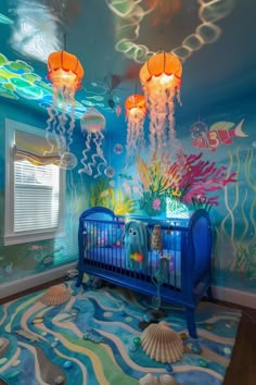 a baby's room decorated with under the sea theme