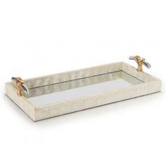 a white tray with two faucets on the bottom and one faucet in the middle