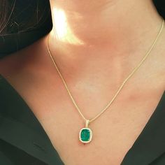 Product Details -- 14K Gold: 2.09 Grams -- 0.16 Ct Genuine Diamond -- Total Weight: 2.09 grams -- Quantity : (1) Necklace -- Emerald: 2.03 Ct. Features -- Made to order -- Fast fully-insured shipping with tracking -- Friendly return and exchange policy -- Ready to ship in 10 to 14 days Each piece of Siam Fine Gold jewelry is made to order and delicately hand-crafted with love and care by our highly-skilled Bangkok artisans. We will gladly meet any special or custom requirements you may have to p Formal Jewelry With Pave Setting For May Birthstone, 14k Gold Green Jewelry With Pave Setting, Green 14k Gold Jewelry With Pave Setting, Gold Gemstones With Halo Setting As Gift, Yellow Gold Jewelry With Pave Setting For May Birthstone, Emerald Jewelry With Pave Setting As Gift, Emerald Jewelry With Pave Setting For Gift, 14k Gold Emerald-cut Jewelry With Pave Setting, 14k Gold Jewelry With Pave Setting And Emerald Cut