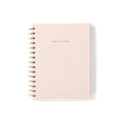 a spiral notebook with the words write it down written in gold foil on pink dotted paper