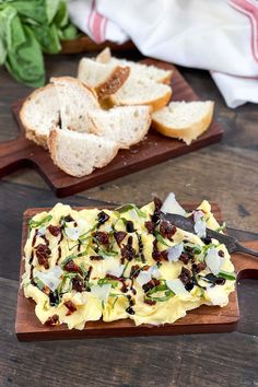 bread and other food on wooden cutting boards