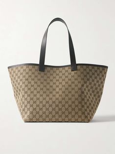 GUCCI Leather-trimmed coated canvas-jacquard tote Bag Wishlist, Gucci Tote Bag, Flat Dress Shoes, Floral Dresses Short, Gg Monogram, Gucci Eyewear, Gucci Tote, Gucci Leather, Shopping Ideas