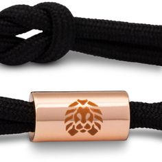 Black small Knotaclat bracelet featuring rose gold electroplated hardware and contrast emblems. -100% Polyester-One size fits most wrists, 4.5" to 6" wrist circumference 1% of net proceeds from all Rastaclat sales are donated to the Seek The Positive Foundation. Knotted Bracelet, Bracelet Knots, Wrist Game, Gold Collection, Custom Bracelets, The Rose, Long Beach, Rope Bracelet, Rose Gold