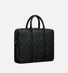 The zipped briefcase pairs timeless elegance with the House's couture spirit. Crafted in black coated cotton canvas with the CD Diamond printed motif, the rigid silhouette showcases Marc Bohan's 1974 graphic design reimagining the CD initials in the form of a diamond with architectural lines. It is enhanced by tonal grained calfskin details and the Dior signature on the front, while the zip closure reveals a spacious interior laptop compartment. Folding handles and an adjustable and removable st Diamond Canvas, Dior Top, Dior Star, Diamond Print, Armani Wallet, Ferragamo Belt, Fendi Belt, Saint Laurent Wallet, Backpack Tote Bag