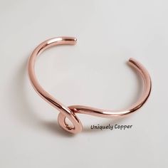 This simple, yet elegant copper cuff bracelet is another favorite of mine! I often pair this tear drop bracelet, for a layered and stacked look, with my three piece copper bracelets set found here: https://www.etsy.com/listing/499787894/copper-bracelets-copper-bangle-twisted It has a 1 1/4 inch opening and is slightly adjustable. When choosing your size, remember to deduct 1 1/4 inches from the length that you select. So, if your wrist circumference is 7 inches you would select a 6 or 6 1/2 leng Rose Gold Copper Bangle Cuff Bracelet, Rose Gold Copper Cuff Bangle, Elegant Rose Gold Copper Bangle, Elegant Silver-colored Copper Cuff Bracelet, Elegant Copper Bracelets As Gift, Elegant Copper Bracelet As A Gift, Elegant Copper Bracelets For Gift, Elegant Copper Bracelet For Gift, Sewing Tape Measure