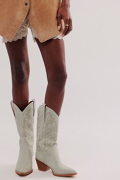 Stun in these so cool western-inspired boots from Jeffrey Campbell featuring classic embroidered details in a luxe leather design with a pointed toe and block heel. Pull-on styleCushioned insoleClassic rounded edgePull tabs on either side | Dagget Western Boots by Jeffrey Campbell at Free People in Blue, Size: US 7.5 Chic Ranch Boots For Spring, Chic Spring Boots For Ranch, Chic Spring Ranch Boots, Chic Summer Boots For Rodeo, Chic Summer Rodeo Boots, Western Heeled Boots For Summer Rodeo, Chic Heeled Boots For Rodeo In Spring, Spring Ankle Heeled Boots For Ranch, Spring Ranch Ankle Heeled Boots