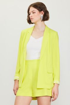 The Top Notch Boyfriend Blazer in yellow?! A statement piece for spring. This fit? A CLASSIC. It has so many great details like working pockets, straight sleeves and a notched collar. Blazers are always sooo chic and this one has the perfect cool girl touch. -Relaxed fit blazer-- straight,, easy fit-Longer length hits at just the right spot-Curved lapel-Open style front-- tres chic-Small shoulder pads for structure-Full length-Fully lined and delicious quality XSmall: 2-4, Small: 4-6, Medium: 8- Chic Green Blazer For Spring, Trendy Summer Blazer For Day Out, Spring Yellow Blazer With Pockets, Green Spring Blazer With Pockets, Spring Green Blazer, Spring Yellow Outerwear With Pockets, Spring Green Blazer With Pockets, Yellow Spring Outerwear With Pockets, Trendy Green Spring Blazer