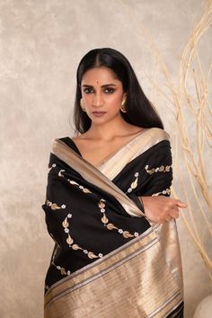 Expertly crafted with pure Katan silk, this black Banarasi saree features intricate Kaduwa sona rupa motifs. The traditional design and luxurious fabric make it a versatile addition to any wardrobe. Elevate your style with this exquisite and timeless piece. Black Banarasi Saree, Katan Silk, Luxurious Fabric, Banarasi Saree, Banarasi Sarees, Beautiful Saree, Unique Charms, Blouse Piece, Luxury Fabrics