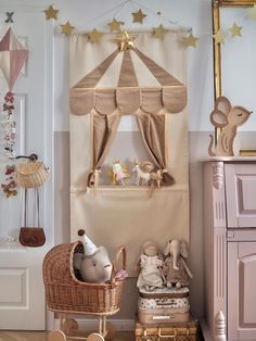 a child's bedroom decorated in pink and gold