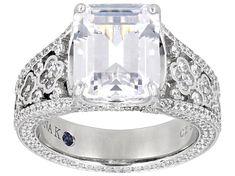 Vanna K™ For Bella Luce® white diamond simulant 9.17ctw rectangle and round, Platineve® ring. Measures approximately 0.88" L x 0.44" W and is not sizable. The diamond equivalent weight is 5.55ctw. Each Vanna K™ design has a signature label that features a lab created sapphire. Luxury White Square Cut Diamond Ring, White Square Cut Fine Jewelry For Wedding, Elegant Rectangular Diamond Ring With Accent Stones, White Rings With Accent Stones For Formal Occasions, Formal White Rings With Accent Stones, Elegant White Square-cut Jewelry, Elegant White Square Cut Jewelry, Rectangular Cubic Zirconia Rings Gia Certified, White Rectangular Cubic Zirconia Ring