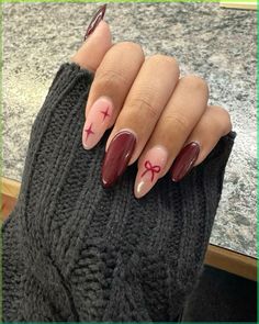 Gel x almond bow nails 🎀 Burgundy Nails With White Design, Bow Nail Inspo Almond, Xmas Nail Inspiration, Almond Bow Nail, Nails Ribbon Design, Cute Bow Nails Almond, Brown Nails With Bow, Bow Nail Designs Simple, Cherry And Bow Nails