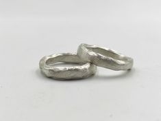 Organic silver band ring.  A thick irregular silver band that can be worn alone or two together also can be combined with others as a stacking ring. It is made of solid 925 silver with a rough finish. It is a simple ring suitable for your everyday casual outfit. It's so simple and yet so special and elegant! Αs each piece is individually handmade, slight variations in texture are possible. DESCRIPTIONS and MEASUREMENTS Material   : Sterling silver. Thickness 0,5 (cm) 0,20 (in") thinnest point to Silver Ring For Men, Rustic Silver Untreated Rings, Rustic Untreated Silver Ring, Brutalist Sterling Silver Rings As Gift, Brutalist Oxidized Open Ring, Brutalist Hammered Silver Ring, Edgy Jewelry, Stackable Bands, Hammered Rings