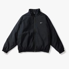 Nike NikeLAB Solo Swoosh Satin Bomber Jacket  BLACK/KUMQUAT/WHITE, DN1266-010 This Nike Solo Swoosh Satin Bomber Jacket is made with silky smooth fabric and comes in a roomy fit with paneled sleeves and dropped shoulders. Crafted with PrimaLoft® and Taffeta lining, the jacket has an elastic waist and cuffs.   - Nike Solo Swoosh Satin Bomber Jacket DOLL/BLACK/WHITE - Loose fit for a roomy feel - Zippered side pockets - Full-zip design - Stand collar - Embroidered Swoosh - 100% polyester Classic Black Long Sleeve Windbreaker, Nike Urban Black Outerwear, Classic Long-sleeved Black Windbreaker, Nike Urban Black Track Jacket, Nike Black Outerwear For Streetwear, Classic Black Windbreaker For Streetwear, Nike Black Windbreaker For Winter, Nike Urban Streetwear Outerwear, Nike Black Fall Outerwear