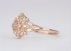 ♥  Solid 14K gold ring set with several diamonds in a vintage-inspired floral design
♥  It's a fairly dainty ring that sits low on the finger and wears pretty light. Would make a great promise ring or birthday present!
♥  If you intend to wear this as an everyday ring, we offer an upgraded version with thicker gold for an additional $100.

♥  Ring size: US 3-9
♥  Ring width: 1mm (This is a *dainty* and light-weight ring. For an upgraded version, contact us for details)
♥  Gemstone: genuine diamo Elegant Flower Ring With Rose Cut Diamonds For Wedding, Elegant Rose Cut Diamond Flower Ring For Formal Occasions, Elegant Yellow Gold Flower Ring For Wedding, Elegant Gold Flower Ring, Elegant Formal Flower Ring With Rose Cut Diamonds, Elegant Wedding Flower Ring With Halo Setting, Elegant Wedding Flower Ring With Rose Cut Diamonds, Elegant Yellow Gold Wedding Flower Ring, Elegant Flower Ring With Rose Cut Diamonds For Anniversary